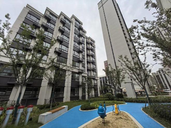 凯发旗舰厅上海中心城区“原拆原建”小区居民回家！这群平均年龄不到35岁的青年人曾打了5000多个电话(图6)