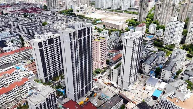 凯发旗舰厅上海中心城区“原拆原建”小区居民回家！这群平均年龄不到35岁的青年人曾打了5000多个电话(图8)